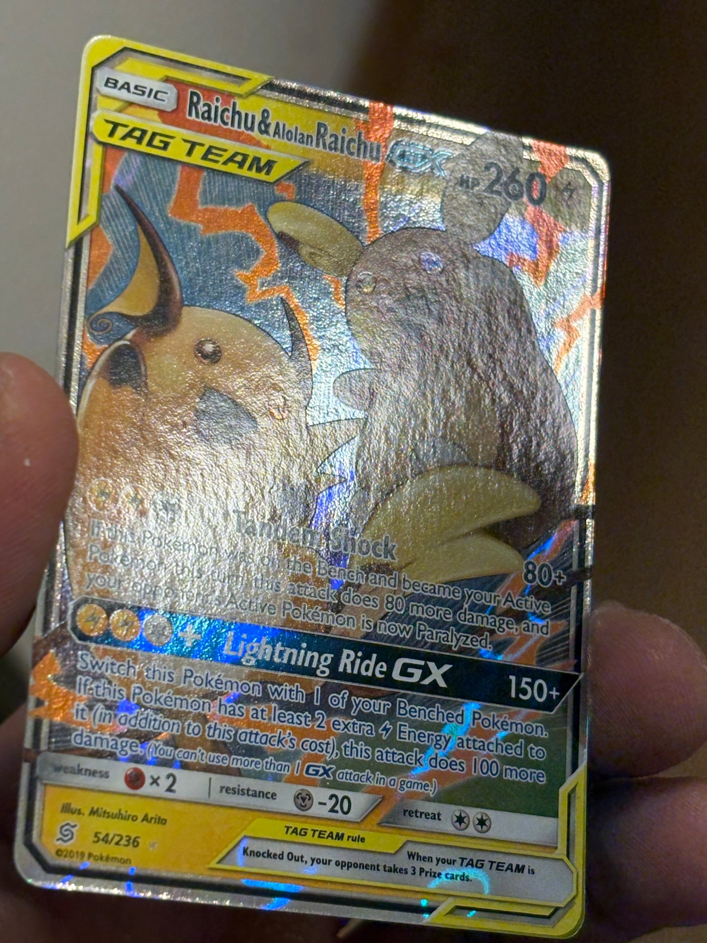 Raichu & Alolan Raichu GX (UNM 54) ENG